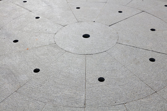 Holes and marks on the flagstone