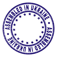 ASSEMBLED IN UKRAINE stamp seal imprint with grunge texture. Designed with round shapes and stars. Blue vector rubber print of ASSEMBLED IN UKRAINE label with dust texture.