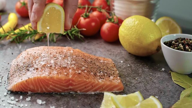 Raw salmon steak with lemon