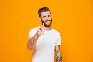 Portrait of a cheerful young man wearing casual clothes