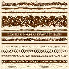 Fototapeta premium Vector set of hand drawn seamless borders made with ink. Freehand textures for fabric, polygraphy, web design.