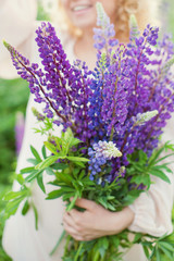 woman and lupines