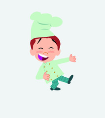 Chef laughing while teaching something to his left. 