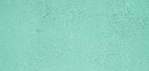 Grunge Decorative Light Green plaster Wall Texture.