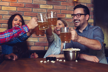Two couples went on a double date to pub on a saturday night. 