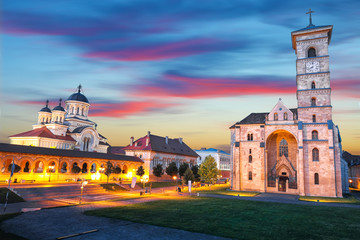 The Coronation Orthodox Cathedral and Roman Catholic cathedral in Fortress of Alba Iulia - obrazy, fototapety, plakaty