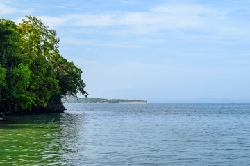 Fototapeta na wymiar Beautiful island with white beach and palms, Cayo levantado paradise 