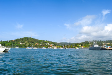 Fototapeta na wymiar Samana port view from ocean with many boats, dominican republic