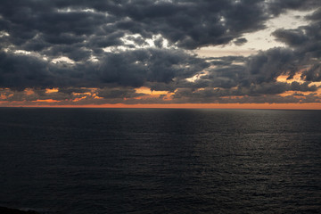 Fototapeta premium Sunset over the sea near the Gozo island, Malta. - Image