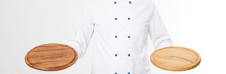 chef holding empty pizza plate isolated on white background,copy space