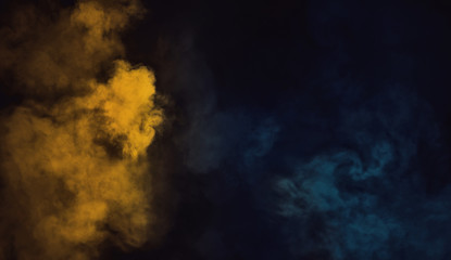Duotone yellow vs blue smoke on background. Misty texture effect