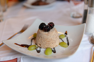 almond ice cream with berries and grapes