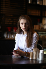The girl in the cafe breakfast