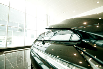 headlight of the car in the showroom
