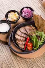 Fired beef tongue served with chili pepper