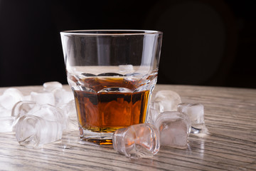 Whiskey glass on a bar counter