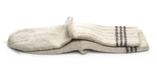Traditional knitted woolen socks isolated on white background