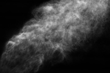 A stream of water and a cloud of drops