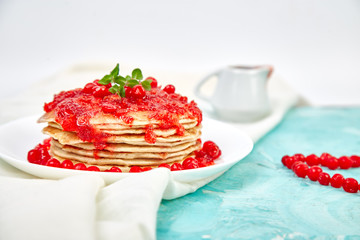 American pancake with jam - berry, viburnum, cranberry