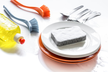 concept of washing dishes on white background