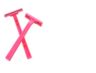 Pink Razor .Removal of unwanted hair. top view. Concept of using razor. Women's Shaving Razor. Shaving razor instrument. Pink shaver in woman hands against pink. beauty, skin care concept .