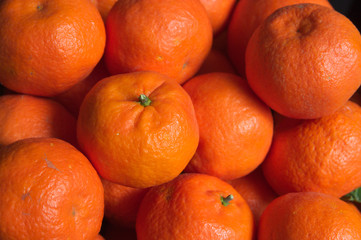 Some ripe oranges in a drawer