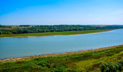 Obraz na płótnie Canvas Photo of big river in Khotyn, view from beach