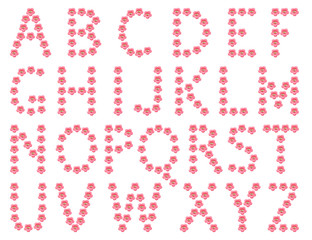 The English alphabet is made up of pink buttons that have the shape of a flower.