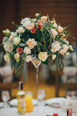 Luxury wedding reception. Details of a rustic wedding table and wooden elements