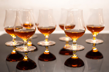 High quality Caribbean rum in modern glass for tasting - obrazy, fototapety, plakaty