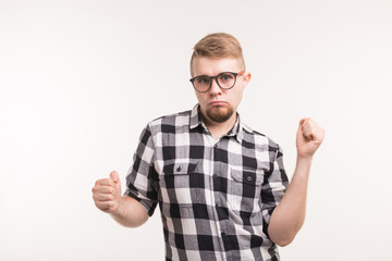 Youth, dancing and people concept - Funny nerd student enjoys dancing alone on white background