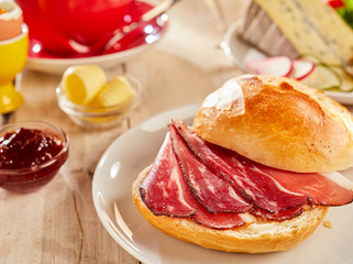 Crispy bacon in fresh white bread bun