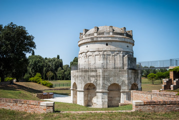Obraz premium Mausoleum of Theodoric the Great in Ravenna, Italy against clear blue sky and greenery