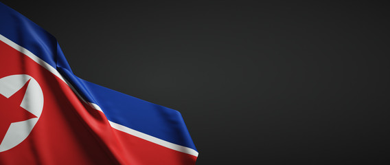 North Korea flag fabric on plain dark background