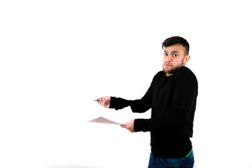 Confused and surprised bearded young man nice and modern holding some documents and pen isolated on a white background