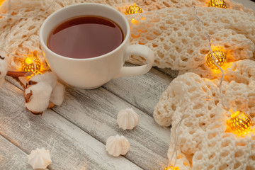 hot tea, meringues, lemons, warm scarf, garland