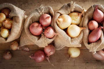 Top view of sack cloth bags with onion