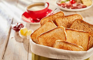 Fresh crunchy toasts in bag, served with coffee