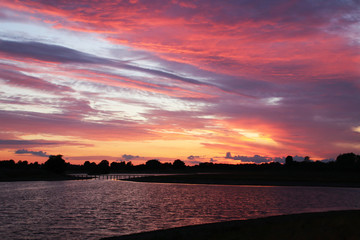 Obraz premium Great colors at sunset and the twilight on it´s way on a beautyful summer evening in Denmark
