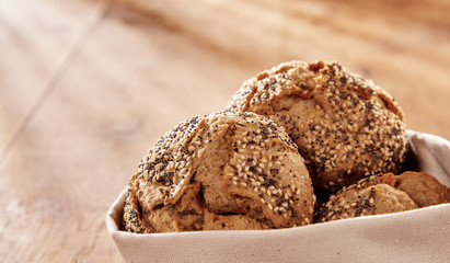 Close-up on brown bread buns with copy space