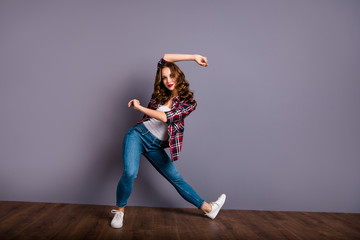 Full length size body view photo fly high amazing attractive beautiful she her lady modern crazy dance flexible wearing casual jeans denim checkered plaid shirt grey background