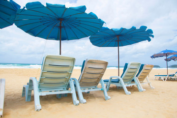 Beach summer holiday with chair and umbrella 