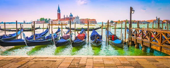 Tuinposter Moored gondolas on Grand Canal in Venice. © Nancy Pauwels