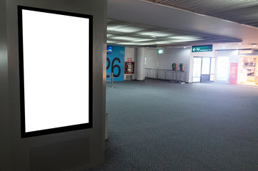 mock up of vertical blank advertising billboard or light box showcase with people waiting at airport, copy space for your text message or media content, advertisement, commercial and marketing concept