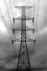 Electricity transmission pylon, High-voltage transmission tower silhouetted