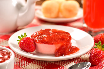 Strawberry individual cheesecake on decorated scene