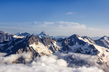 Fototapeta na wymiar Majestic mountain peaks of the Caucasus of Russia