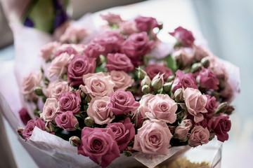 Big bouquet of pink roses close-up, selective focus. Valentine's Day