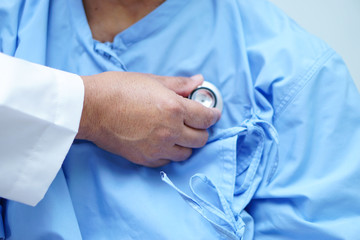 Doctor check and help Asian elderly woman patient with love, care, helping, encourage and empathy...