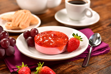 Strawberry individual cheesecake on decorated scene